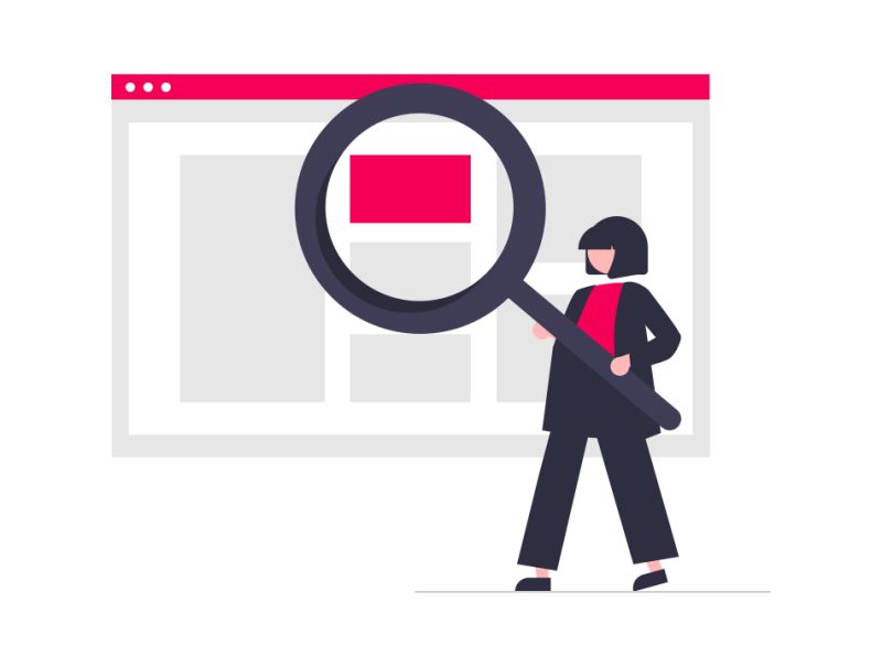 woman holding a magnifying glass